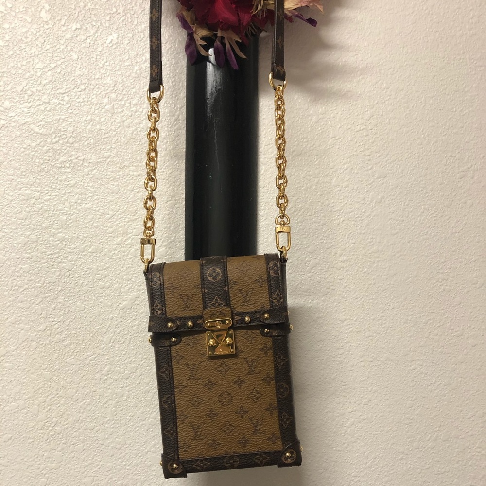 Louis Vuitton monogram trunk pochette